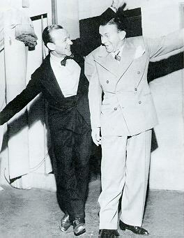 [George and Fred Astaire during the shoting of 'Damsel in Distress']