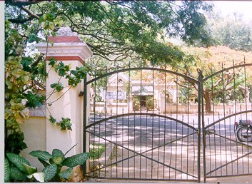 Through the gate to an identical house across the road