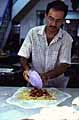Singapore - Indian Man making Roti Prata