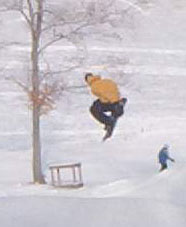 Snowboarder doing a Grab