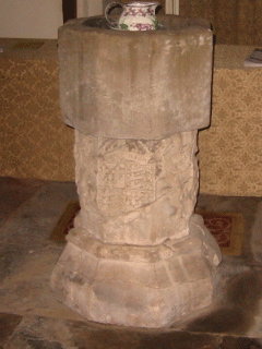Font with Arms dated 1583