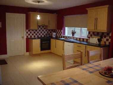 Fully equipped Kitchen & Utility room with washer & dryer.