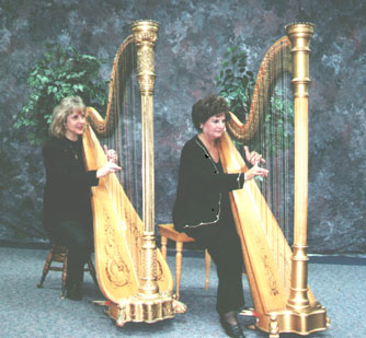 Two Harpists palying their Harps