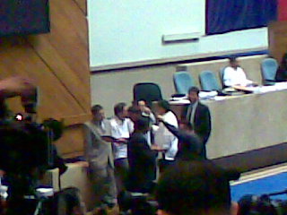 Shot from afar: Presidential First Son Rep. Mikey Arroyo and then newly elected Speaker of the House Rep. Prospero Nograles