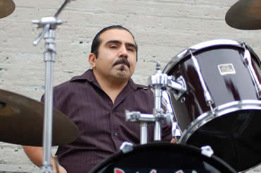 Manny Contreras...CLICK HERE and check out his other band Liquid Lounge