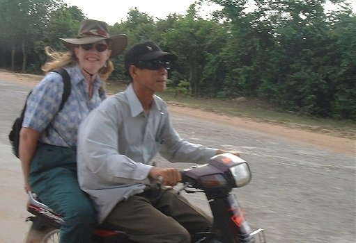 Karen (with driver, Nak) whizzing off to see some of the ruins at Angkor--Cambodia