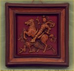 A small plaque `Saint George and the Dragon`.