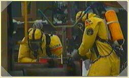Pic. 1: Two Hazmat-Workers in Trellchem TS Suits.