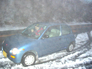 Jamie driving in the snow