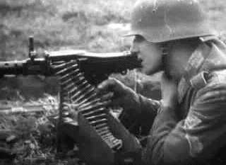 Wehrmacht soldier aiming MG 34