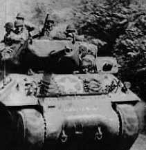 US Infantry riding on M10 Tank Destroyer
