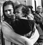 Mother and child in food line at Glide Memorial Church in San Francisco