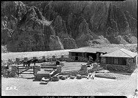 MULE SHELTER & CORRAL AT ROCK HOUSE NEAR PHANTOM RANCH. (BLDG 222) COLORADO RIVER BEHIND. CIRCA 1935. NPS PHOTO