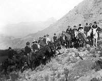 TOURIST PARTY OF 18 RIDING HORSES & MULES ON THE BASS TRAIL. INNER CANYON. CIRCA 1910. BASS. 