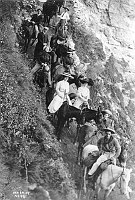 MULE PARTY, BRIGHT ANGEL TRAIL, T.L. BROWN GUIDE (BEHIND) PHOTO # 96, NINE PERSONS IN PARTY. A VARIETY OF HATS. 29 SEP 1909. KOLB BROS.