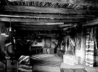 A BLANKET ROOM OF THE HOPI HOUSE, DOORWAY ON RIGHT. BLDG. # 545. GRCA 15803. CIRCA 1906. DETROIT PHOTOGRAPHIC. 