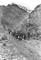 C.C.C. ENROLLEES WORKING ON A FLAT STRETCH OF THE KAIBAB TRAIL. 20 DEC 1935. NPS.