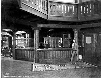 EL TOVAR HOTEL - THE OFFICE. FRONT DESK AREA. SWITCHBOARD. DESK CLERK & BELLMAN. CIRCA 1905. DETROIT PHOTOGRAPHIC.