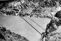 FIRST SWINGING SUSPENSION BRIDGE (1921) OVER THE COLORADO RIVER. 420FT (128M.) SPAN. LOCATED BELOW PRESENT BLACK BRIDGE. CIRCA 1927. MATTHES. 