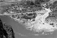 NEAR PHANTOM RANCH. OVERVIEW OF THE ROUTE BRIGHT ANGEL CREEK TOOK DURING 1995 30-YEAR FLASH FLOOD. SHOWS CHANNELING OF THE CREEK AND DEBRIS FAN CREATED TO THE EAST OF CONFLUENCE. MAR 1995. NPS PHOTO BY SJORS. 