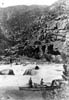 #17238 - MEN OF POWELL'S SECOND EXPEDITION PORTAGING BOAT THROUGH HELL'S HALF MILE, LADORE CANYON. 1871