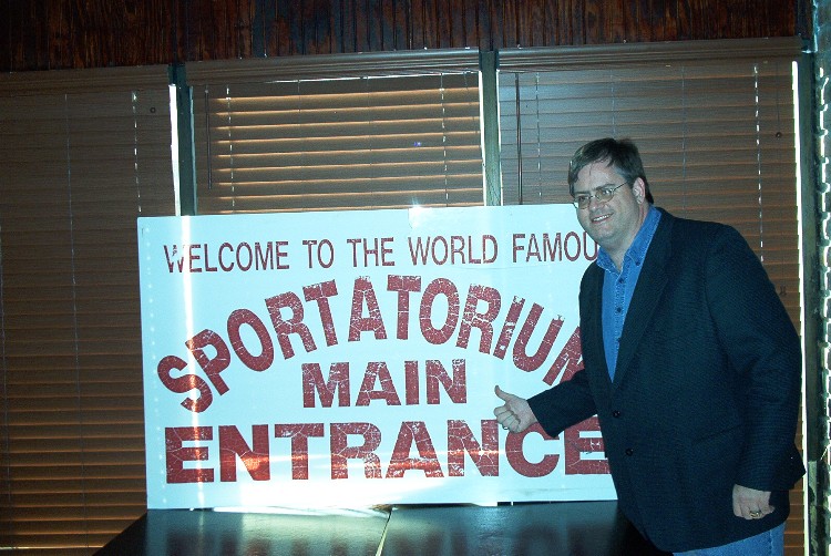 Rob with the Sportatorium sign