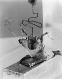 The first transistor. Brattain and Bardeen's pnp point-contact germanium transistor operated as a speech amplifier with a power gain of 18 on December 23, 1947.