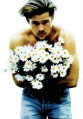 Imagine this man giving you flowers... *sigh*