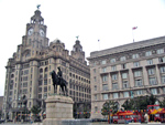 The Cunard building is on the right while the Port of Liverpool lies on the left of the Edward VII monument 