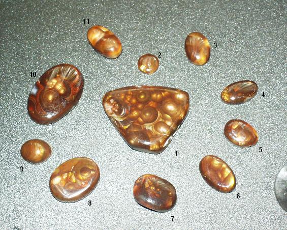 Fire agates, 1 3/8 cts to 58 cts