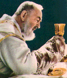 (photo of Padre Pio elevating the chalice)